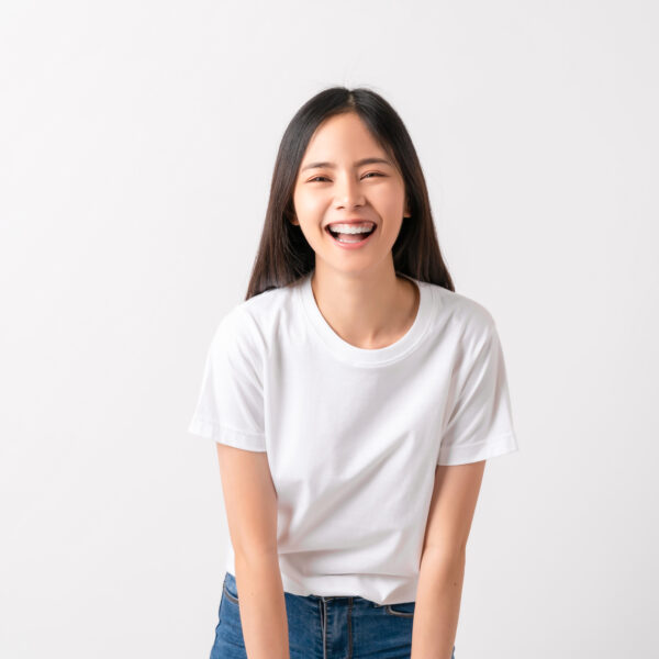 Smiling woman in white t-shirt
