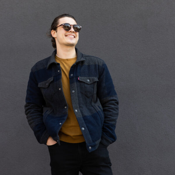 Stylish man with hands in pockets.